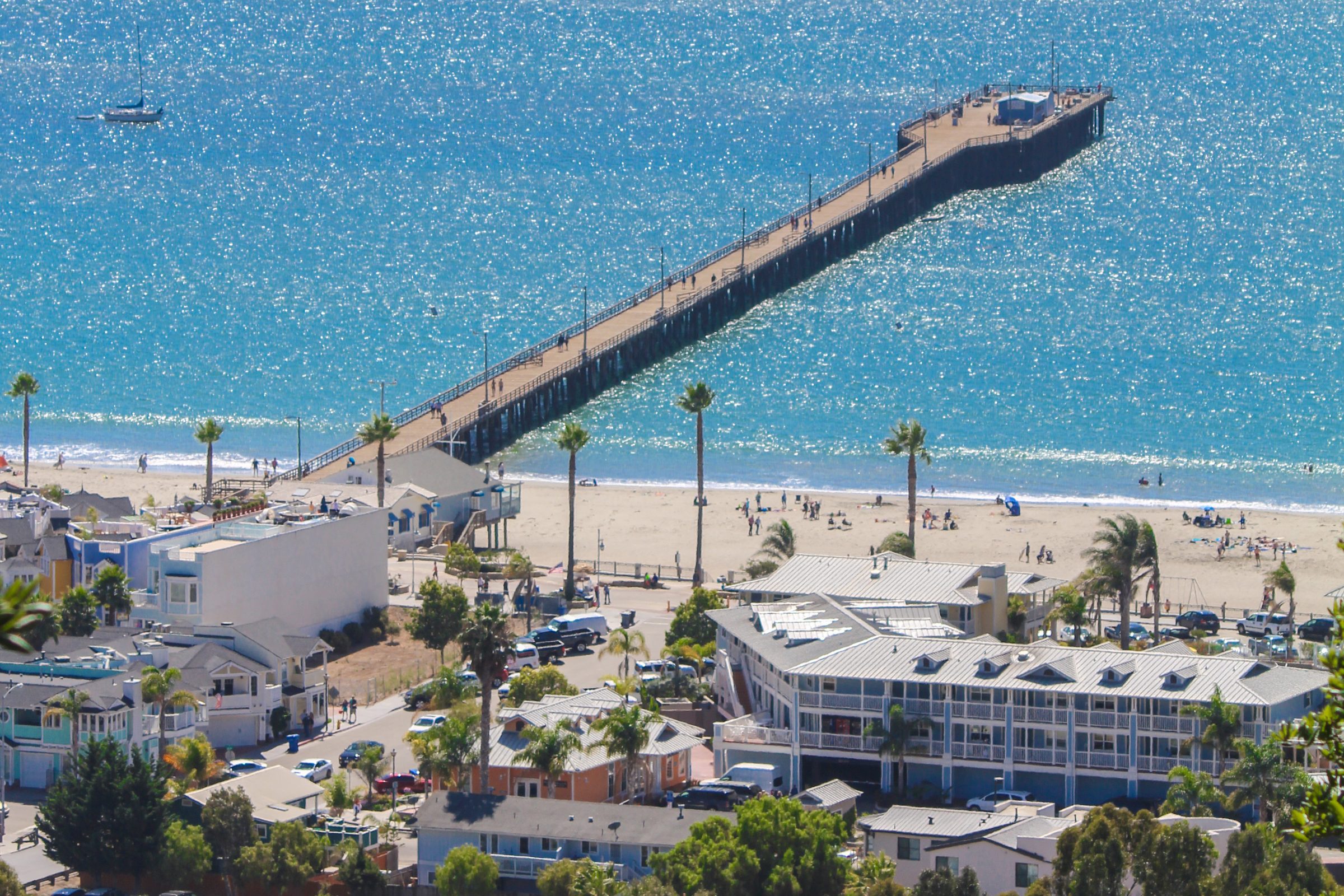 The beachfront hotels, Avila Beach and the pier from the hill above town