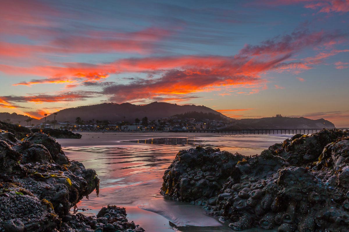 Pink clouds reflected in the tide pools at Avila Beach