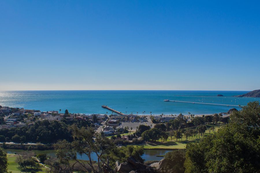 Wide view of Avila Beach, both piers and San Luis Bay from the hills above the golf course