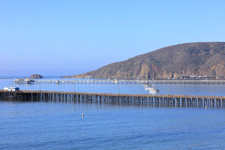Avila Pier and Cal Poly Pier on a clear day, with Point San Luis and Harford Pier beyond